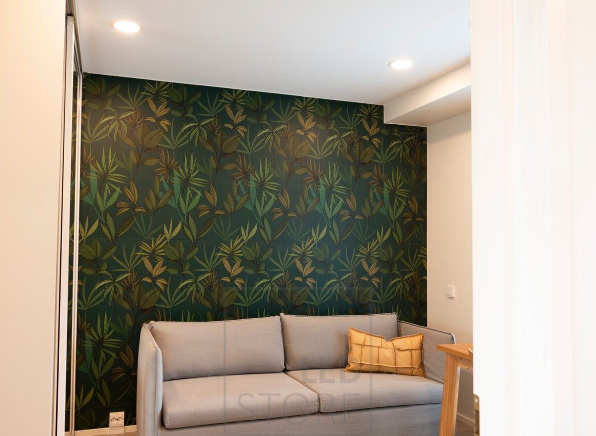 In the living room, circular LED panels illuminate a high quality general lighting. Ledstore.fi